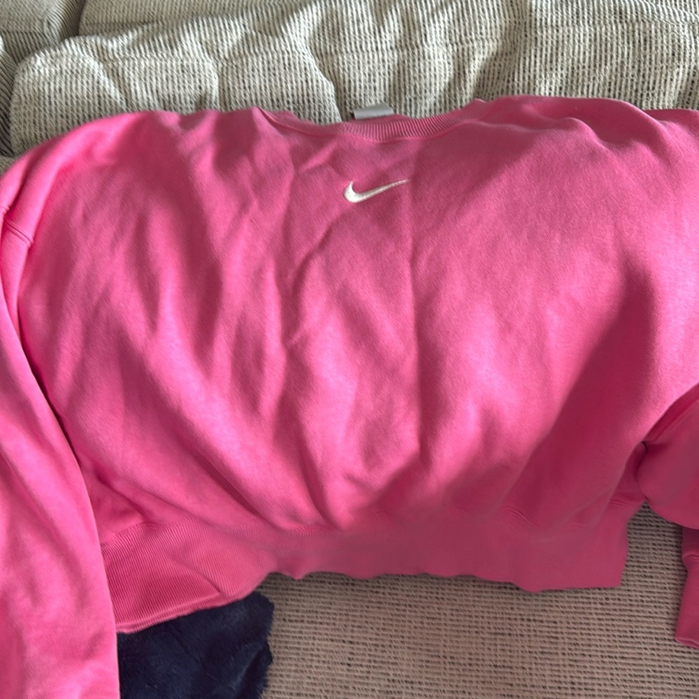 Pink Nike sweatshirt. Somewhat cropped. Size M. Worn 3x.